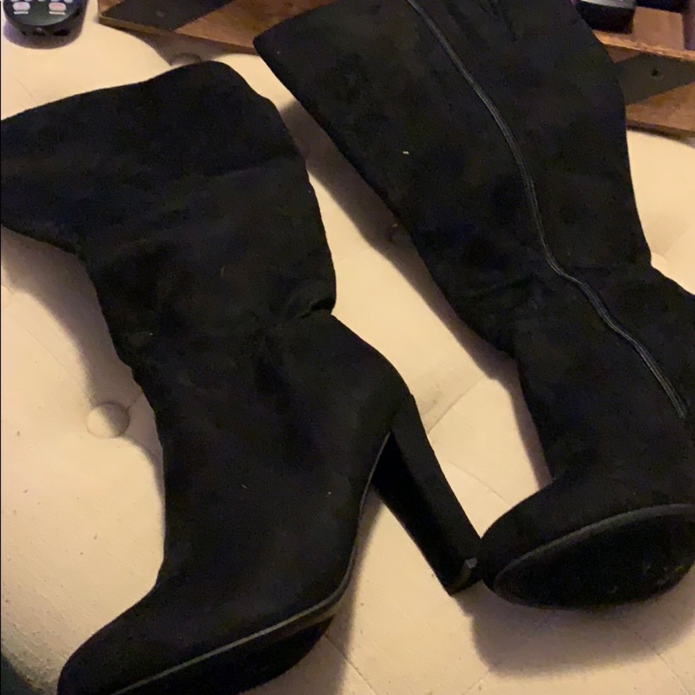 Black zip up boots. Size Seven wide. Suede.